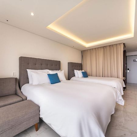 Sweet May Seogwipo Hotel Bagian luar foto